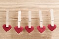 Red fabric heart hanging on the clothesline Royalty Free Stock Photo