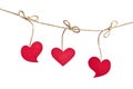 Red fabric hearts hanging on the clothesline Royalty Free Stock Photo