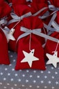 Red fabric pouches with white stars.
