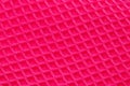 Red fabric texture. Close-up of an elastic scarlet nylon fabric with seamless pattern for sports equipment, backpacks, bags or Royalty Free Stock Photo