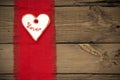 Red Fabric Texture With Heart Cookie Royalty Free Stock Photo