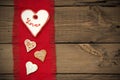 Red Fabric Texture With Heart Cookies Royalty Free Stock Photo