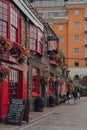 Red facade of the Anchor pub in Bankside, London, UK Royalty Free Stock Photo
