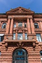 Red facade of the Deutsche Bank building in Bremen Royalty Free Stock Photo