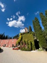 Red facade of the villa Cordevigo Wine Relais is covered with ivy. Italy Royalty Free Stock Photo