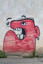 Red face character graffiti art