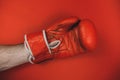 red faded boxing gloves on red background