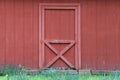 Red farm barn double door grass path