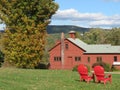 Red Farm House on a Field of Grass Royalty Free Stock Photo