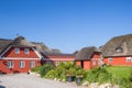 Red farmstead with thatched roof in historic village Christiansfeld Royalty Free Stock Photo