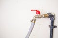 Red Faucet and hose Royalty Free Stock Photo