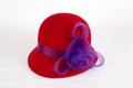 Red Felt Hat with Purple Ribbon Royalty Free Stock Photo