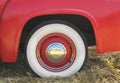 Red fender and whitewall tire Royalty Free Stock Photo