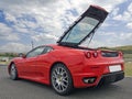 Red ferrari f430 with tailgate open Royalty Free Stock Photo