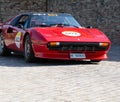 Red Ferrari 308 Gts, an old racing car during the rally Mille Miglia 2022 Royalty Free Stock Photo