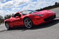 Red Ferrari with mirror paint on a track in Florida Royalty Free Stock Photo