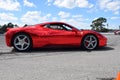 Red Ferrari with mirror paint on a track in Florida Royalty Free Stock Photo