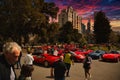 Red Ferrari super car in Melbourne with people outside the Royal exhibition building