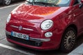 Red Fiat 500 front parked in the street Royalty Free Stock Photo