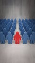 Red figure among blue figures, standing out against gray background, individuality highlighted Royalty Free Stock Photo