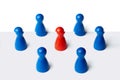 Red figure in the middle of 6 figures. Business concept for leadership, teamwork or groups. Isolated on white background Royalty Free Stock Photo