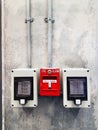 Red Fire Alarm Box Mounted on the Wall Royalty Free Stock Photo