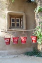 Red fire buckets filled with sand Royalty Free Stock Photo