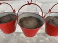 Red fire buckets, Fire Safety, Sand Filled Bucket use to Prevent Fire at petrol pump. Royalty Free Stock Photo