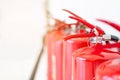 Red fire extinguisher close up focus