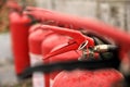 Fire extinguishers lined up before practice use