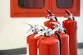 Red fire extinguishers tank Royalty Free Stock Photo