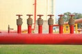 Red fire hose valve Royalty Free Stock Photo