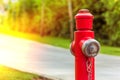 Red fire hydrant along the road close up Royalty Free Stock Photo