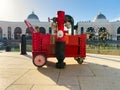 Red fire hydrant cart displayed in modern public square environment Royalty Free Stock Photo