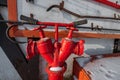 Red fire hydrant surrounded in snow. fire-fighting devices in the forest Royalty Free Stock Photo