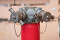 Red fire hydrant water pipe with a chain Royalty Free Stock Photo