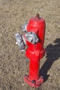 Red fire hydrant water pipe on street Royalty Free Stock Photo