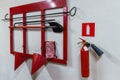 Red fire stand with fire extinguishing tools