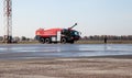 Red fire truck at the airport. Outdoor transportation car. Airport fire engine.