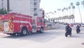 Red firefighters fire truck or engine, emergency lifeguard car, , California USA