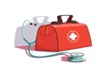 Red first aid kit and stethoscope equipment