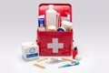 Red first aid kit with supplies Royalty Free Stock Photo