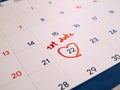 Red first Date marked on white calendar agenda target date for romance and dating Royalty Free Stock Photo