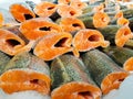 Red fish fillet in ice close up Royalty Free Stock Photo