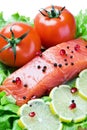 Red fish and fresh vegetables Royalty Free Stock Photo