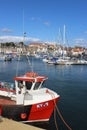 Red fishing boat in Anstruther harbour, Scotland Royalty Free Stock Photo