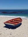 Red fishing boat beached in Lamberts Bay