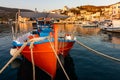 Red fishing boat in the harbor on Andros