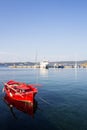 Red fishing boats anchored in the sea. Harbor Ammouliani, small island in Greece Royalty Free Stock Photo