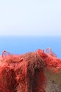 Red Fishing net upon a wall Royalty Free Stock Photo